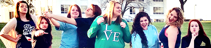 The AST ladies doing a silly pose.