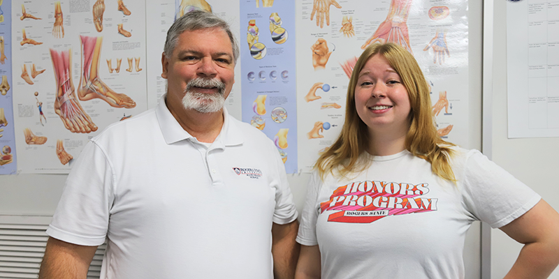 Allied Health Program Coordinator Brian Coley (left) and allied health student Lillian Walsh, currently studying to become a physical therapist.