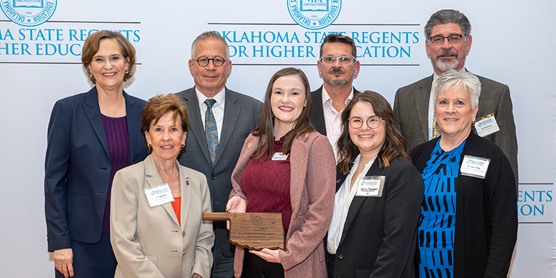 Rogers State University and Claremore Economic Development representatives were recently awarded Oklahoma State Regents for Higher Education’s Regents Business Partnership Excellence Award. Pictured: Regent Ann Holloway (front, from left); Caitlyn Ngare and Bailey Thompson, Claremore Economic Development; Dr. Susan Willis, Rogers State University academic dean; Chancellor Allison Garrett (back, from left); Regent Jack Sherry; Dr. Curtis Sparling, RSU Technology and Justice Studies department head; and Dr. Mark Rasor, RSU vice president for administration and finance.