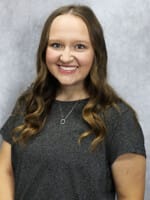 Woman smiling in professional attire