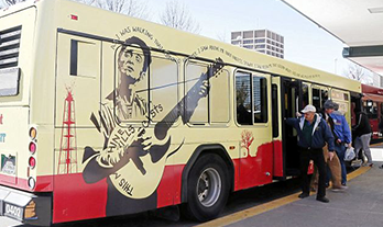 Tulsa Transit bus with Riggs' design on it.