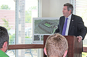 Dr. Larry Rice addresses the crowd during the ceremonial groundbreaking for University Village C.