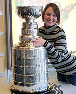 Sarah poses with the Stanley Cup.