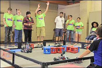ART Academy participants use robots