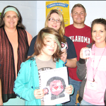 RSU and Chouteau students pose with their Hillcat sticker designs.