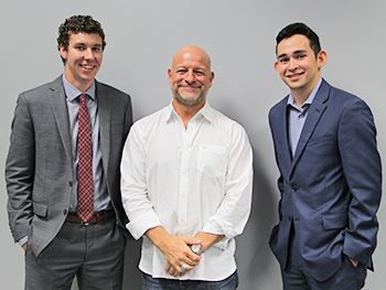 Honors students Seth Blanton (left) and Edgar Zetina (right) stand with Bobby Stem (center), a professional lobbyist with Capitol Gains. Blanton and Zetina created Success Series to give students the chance to connect with and learn from successful professionals in Oklahoma.