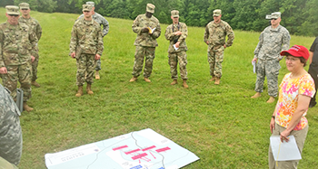 RSU Professor Jane Johansson listening as the Soldiers discuss the actions on the battlefield.