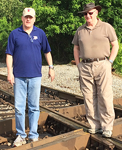 RSU Professor Paul Hatley (left) and British Army veteran Jim Carrick stand at the railroad crossroad in nearby Corinth, Mississippi. The Battle of Shiloh was fought to control this key objective.