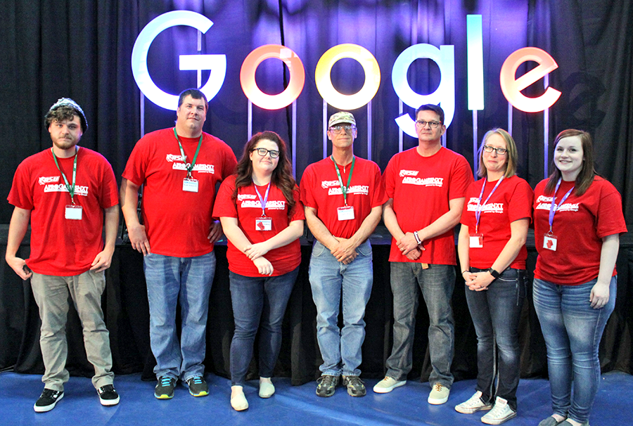 From left to right: Jared "Reed" Tarpley, Scott Giannelli, Amber Cowan, David Rea, Instructor R. Curtis Sparling, Brandi Cerrito, and Kasey Amos pose for a team photo at the fifth annual Aero Games, held in partnership with Google. 