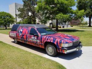 Hearse decorated with RSU colors and Hillcat