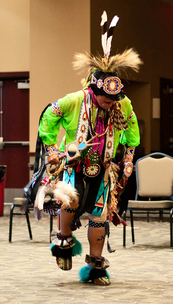 Man performing at Powwow