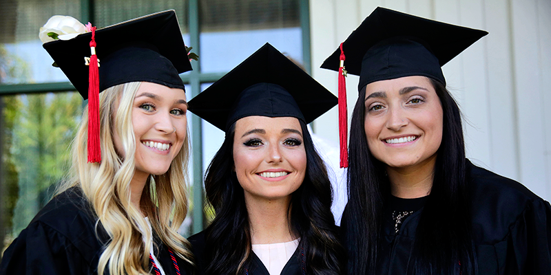 Girls in cap and gown