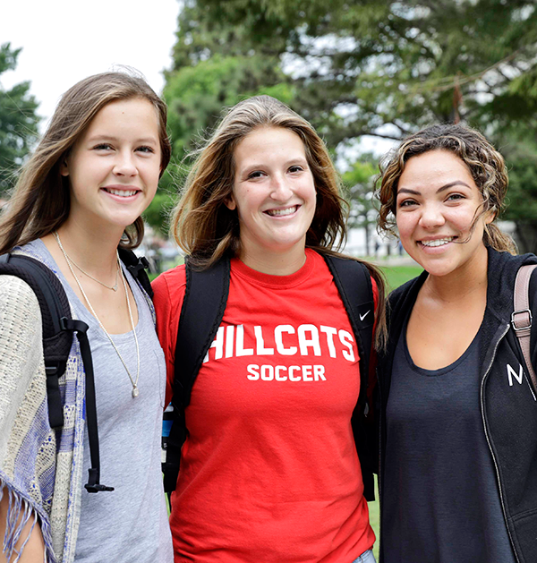 Three girls smiling