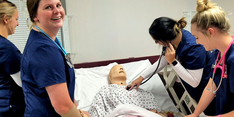 nursing students listening to heart