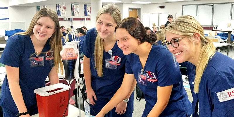 nursing students in lab