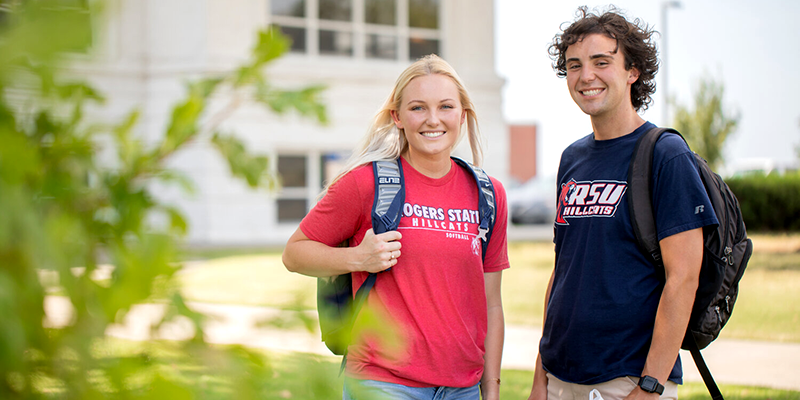 2 students wearing hillcat shirts