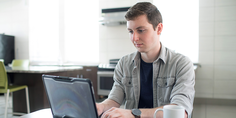 boy using laptop