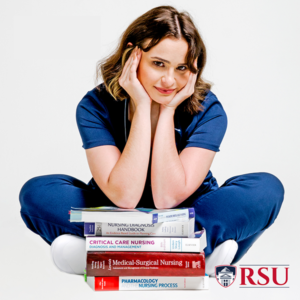 Girl in scrubs with stack of nursing books