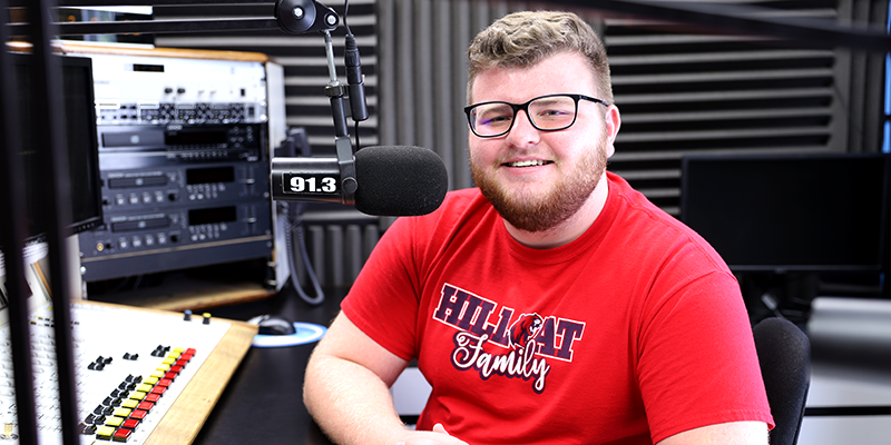 boy in radio booth