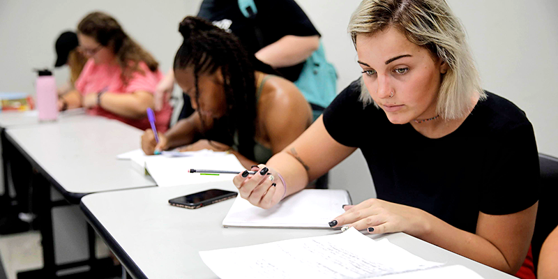 students taking notes in class