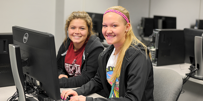 girls at computer station