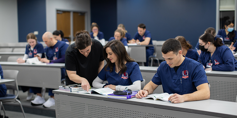 Nursing students in classroom with instructor