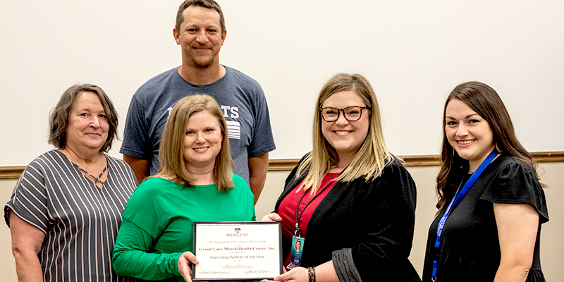 group photo with certificate