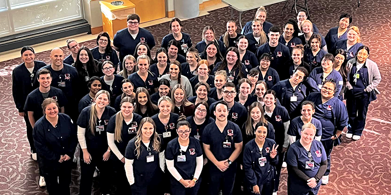 large group of nursing students posing for photo