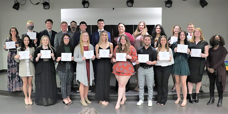 group posing with certifcates