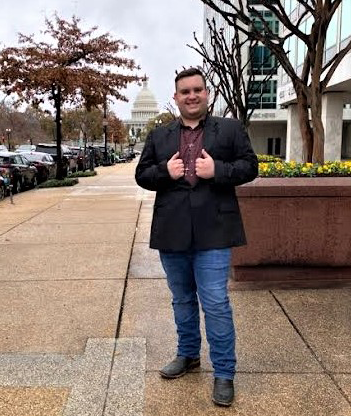 logan burke in front of capital in dc