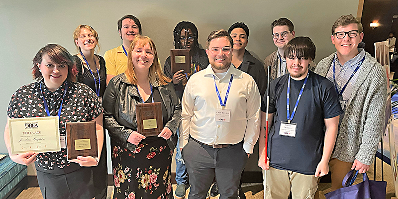 Several Rogers State University communications students took home awards – including four first prizes – at the recent Oklahoma Association of Broadcasters/Oklahoma Broadcast Education Association conference. Students of distinction included Jordan Capron (front, from left), Lacie Drewes, Caleb Broeker, Masson Maddox, and Isaac Dean; Sky Scott (back, from left), Jason Foley, Paul Said, Cris Loya, and Jace Bain.