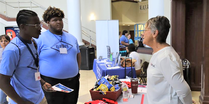 students browsing a career fair