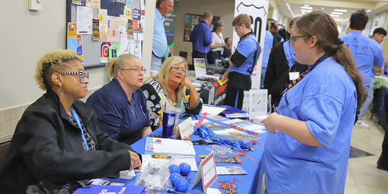 students browsing a career fair