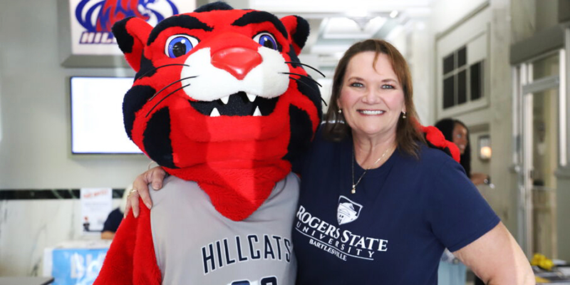 woman with mascot