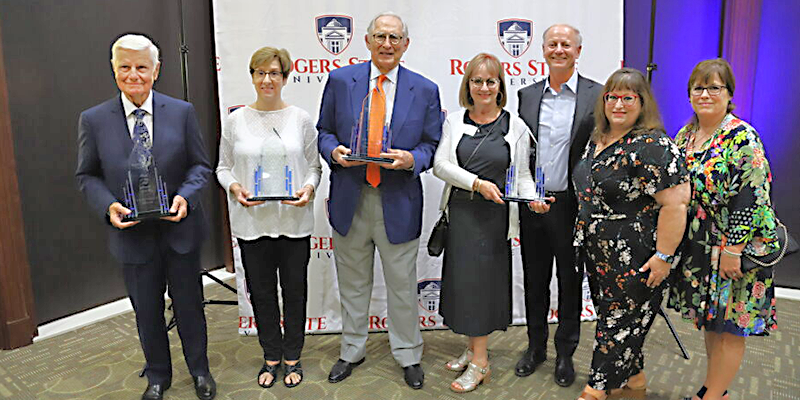 Heroes of the Hill awards were presented to Dr. Richard Mosier (from left), Lisa Surritte (on behalf of her late mother, Carlene Webber), Donne Pitman (on behalf of the H.A. and Mary K. Chapman Charitable Trust), and members of the Podpechan family (on behalf of Frank W. Podpechan). Also receiving a Heroes of the Hill award was Stratton Taylor (accepted by Clayton Taylor).