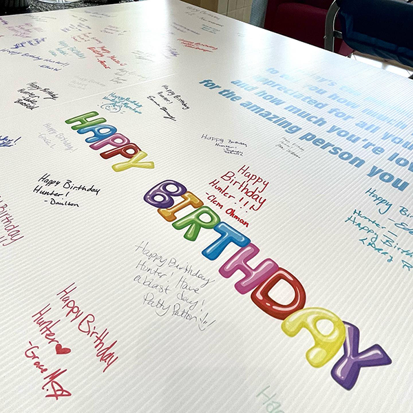 oversized birthday card with signatures