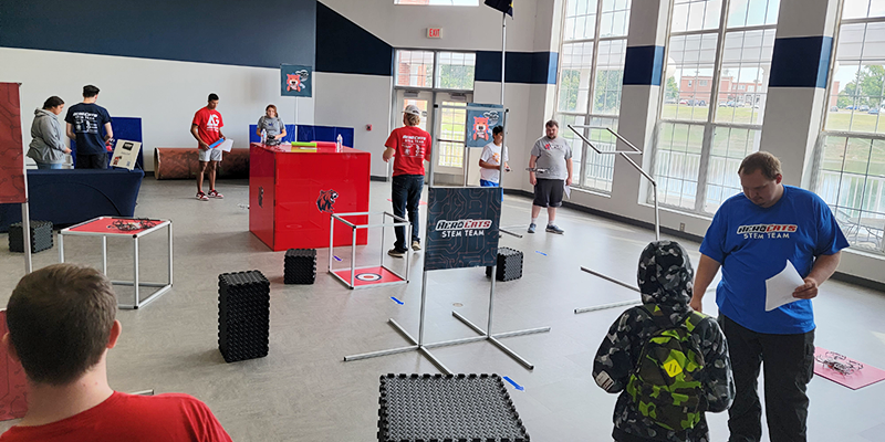 Elementary students learning about and building drones