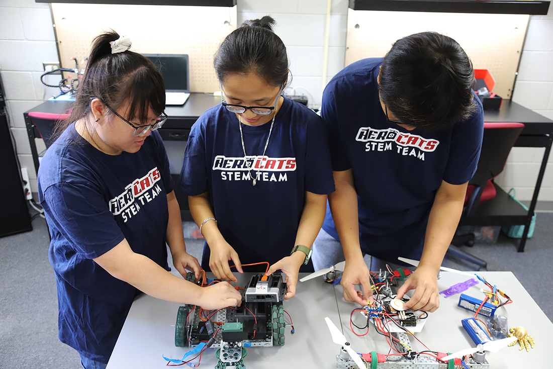 Members of Rogers State University’s first robotics team, “The RoboClaws,” include My Le (from left), Nghi Nyguen and Kai Nguyen, all of whom are from Vietnam.