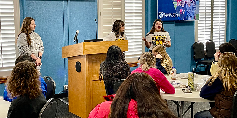 Students listening to a presentation