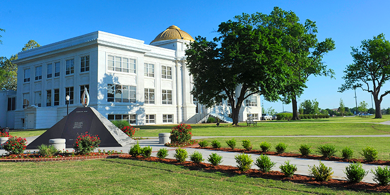 Prep Hall - White building gold dome