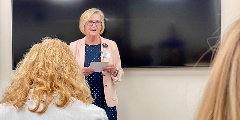 woman speaking to group