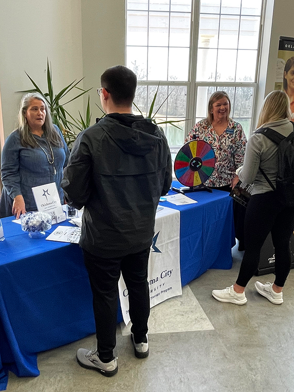 Students at a graduate college fair