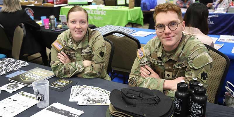 2 army cadets at a career fair