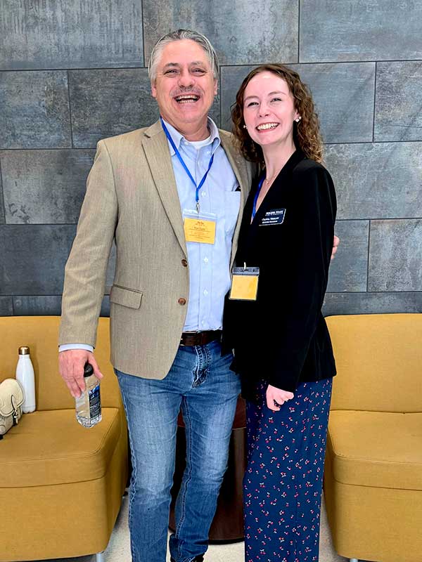 RSU History major Olivia Neeley (right) recently presented her capstone paper on public reaction to the bombing of Hiroshima and Nagasaki at the Phi Alpha Theta Conference in Edmond. Neeley’s father (left) also attended the conference, in support of his daughter.