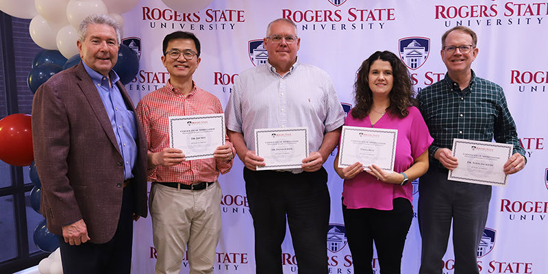 Rogers State Universities recognized several of its longtime employees April 30 during the Length of Service Recognition Ceremony. RSU President Dr. Larry Rice (from left) thanked Dr. Jin Seo, Dr. David Johnk, Dana Best, and Dr. Todd Jackson for their 10 years of service. Also recognized for 10 years of service (not pictured) were Veronica Rackley, Dr. Marla Smith, Don Thompson, and Andrea Vaughan.