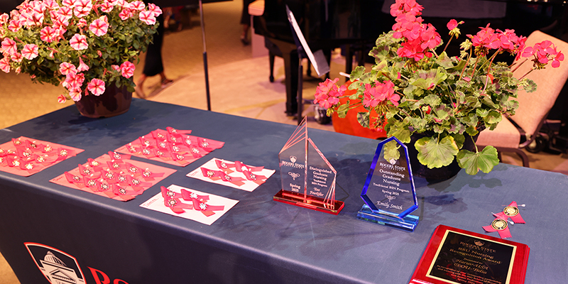 A table of pins and awards